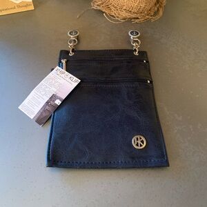 The HIP KLIP, NEW WITH TAGS, cell phone pocket no belt needed.